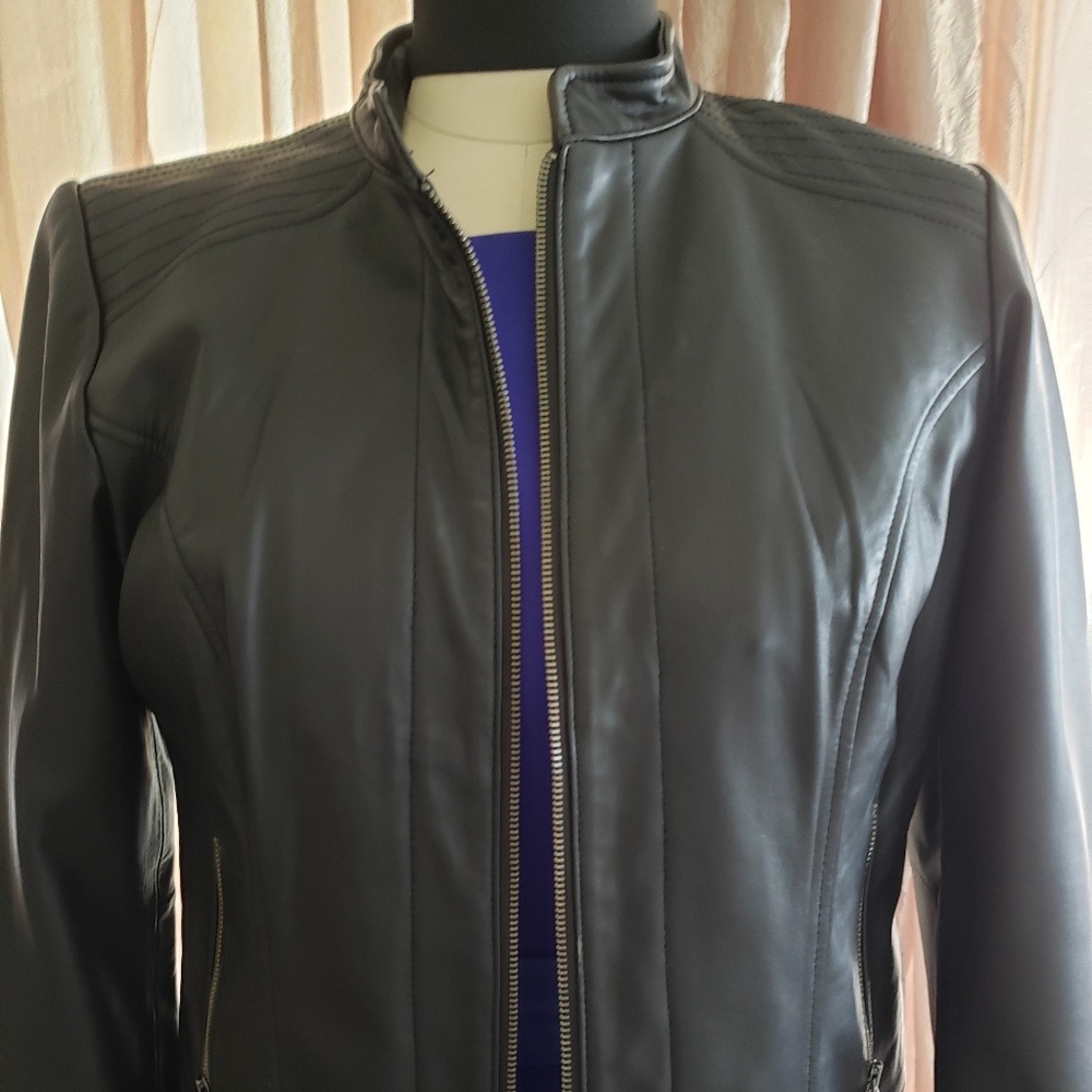 Soft leather jacket. 22 inches from shoulder.
